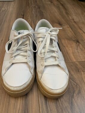 Nike Women White Sneakers with Black Swoosh and Gum Sole